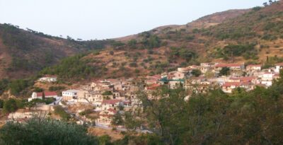 The Greek village where the houses are built one stitched to the other