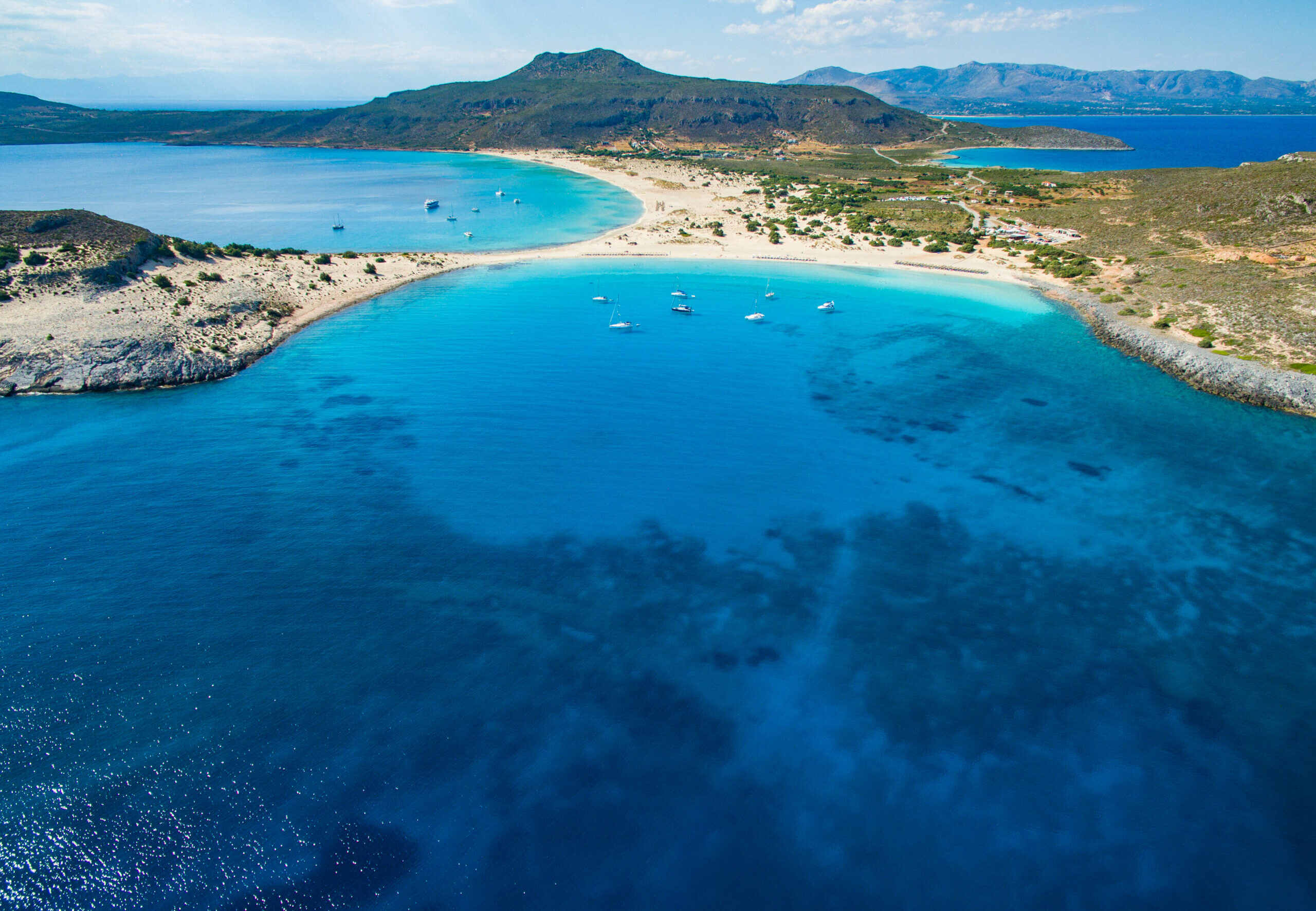 Simos: 1.5 km turquoise beach and white sand